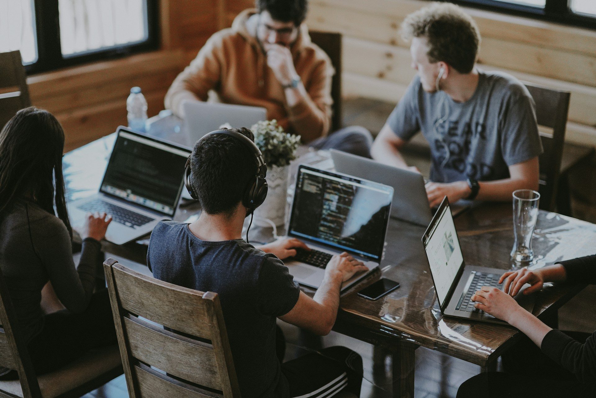 Diverse business team collaborating on industry-specific software and digital transformation